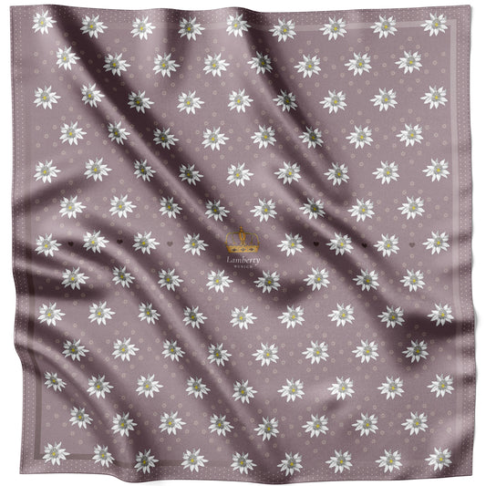 Violettes Alpine Edelweiss Seidentuch 70 × 70 cm flach ausgelegt auf mauvefarbenem Grund