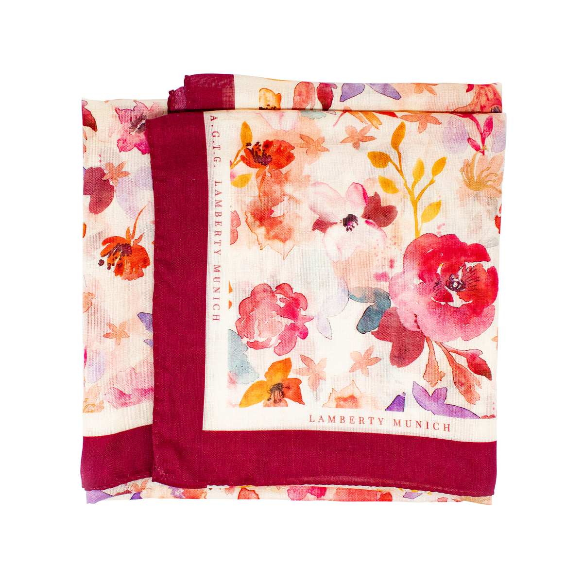 Floral Dreamscape silk and wool scarf folded into a rectangle, the lettering visible