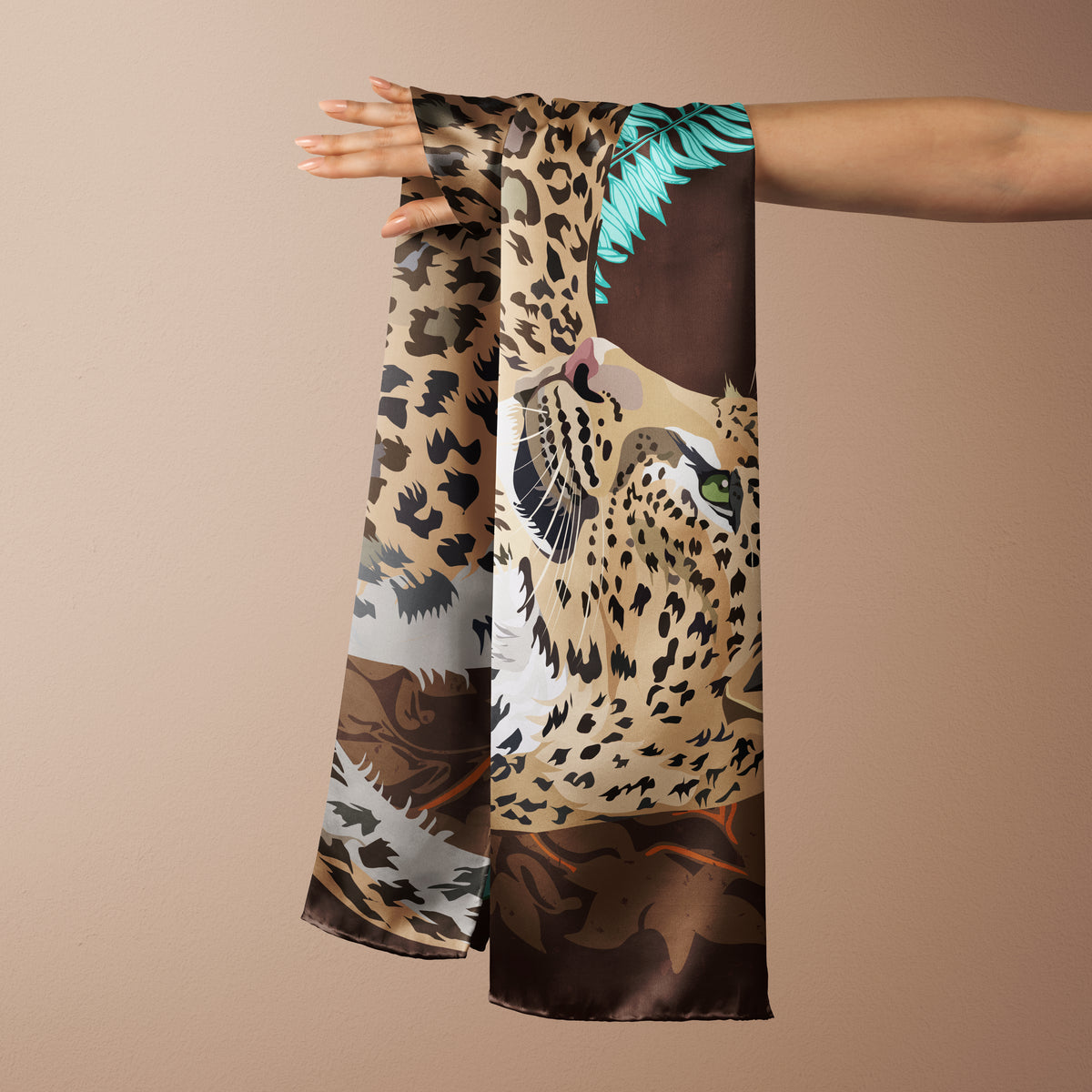Brown Leopard in Jungle Motif silk scarf draped over an outstretched arm against a beige background