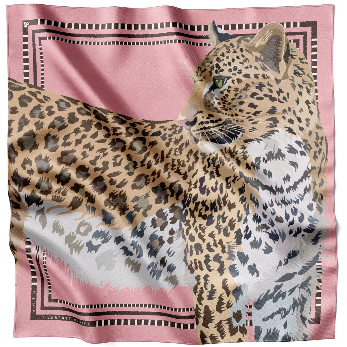 Panthera silk scarf laid flat with a large leopard head on pink and the geometric border